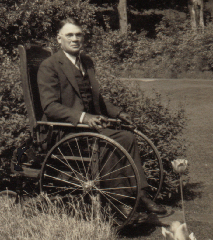 Robert Strong Woodward on terrace outside of Southwick house 